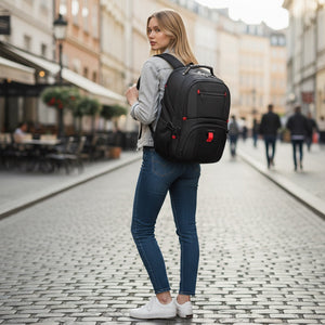 Hostecno black water-resistant laptop backpack with red accents, fits 17" laptops, airline approved for travel.