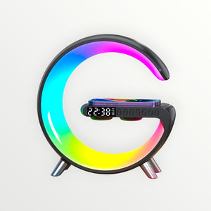 Hostecno G-shaped Bluetooth speaker with wireless charging, alarm, and 256 RGB lighting modes. Features a digital clock and a phone charging on top.