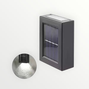Hostecno black solar outdoor spotlight with up and down light, waterproof IP65 rated, ideal for gardens and walls.