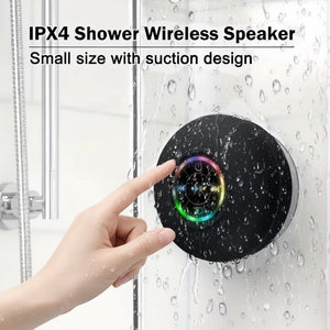 Hostecno black mini waterproof Bluetooth shower speaker with suction cup mount and colorful LED lights.